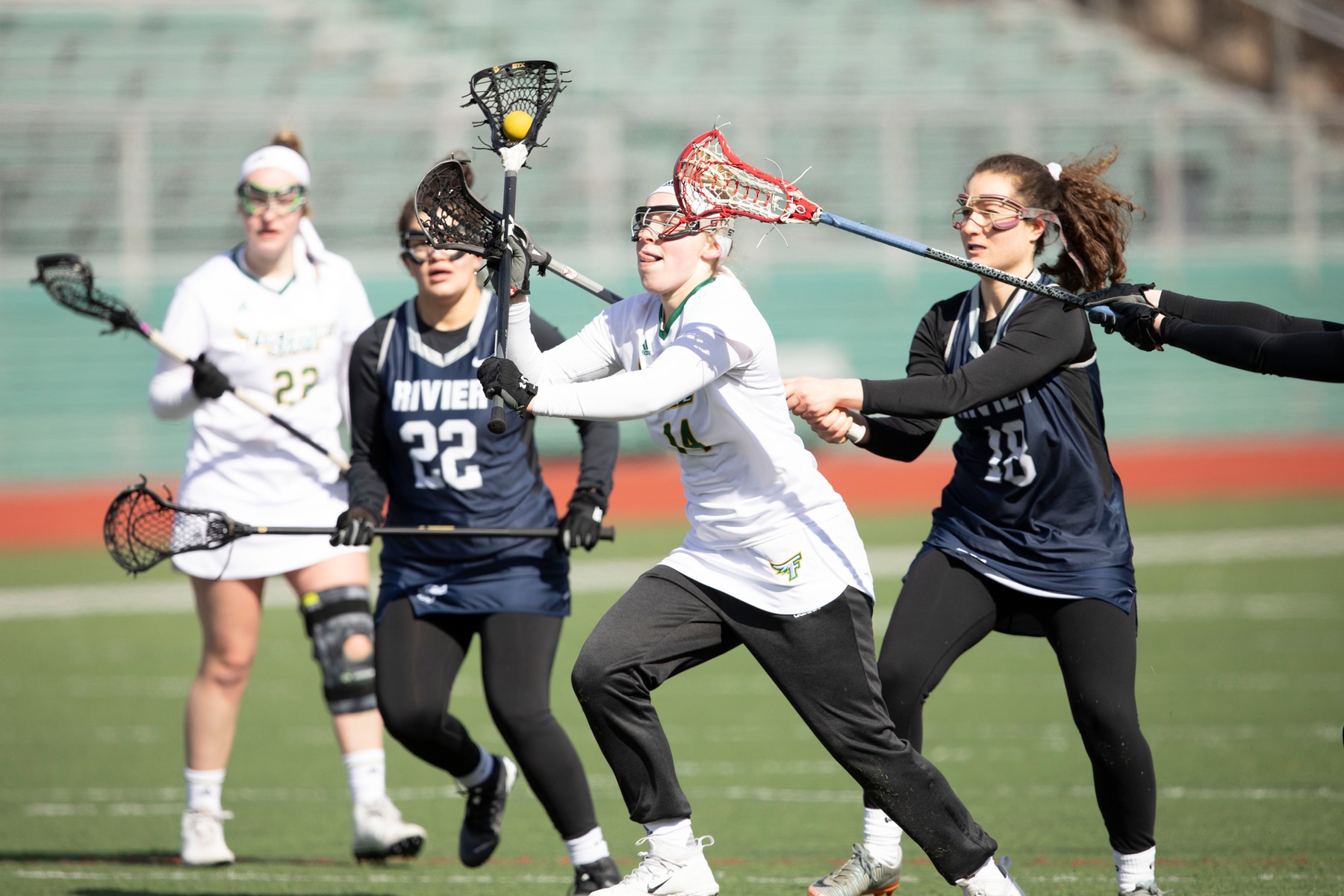 Falcons Race Past Rivier in Home Opener